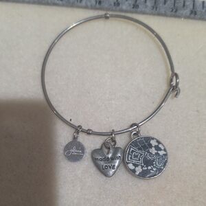 Elegant Silver Bracelet with Heart and Patterned Disc Charms